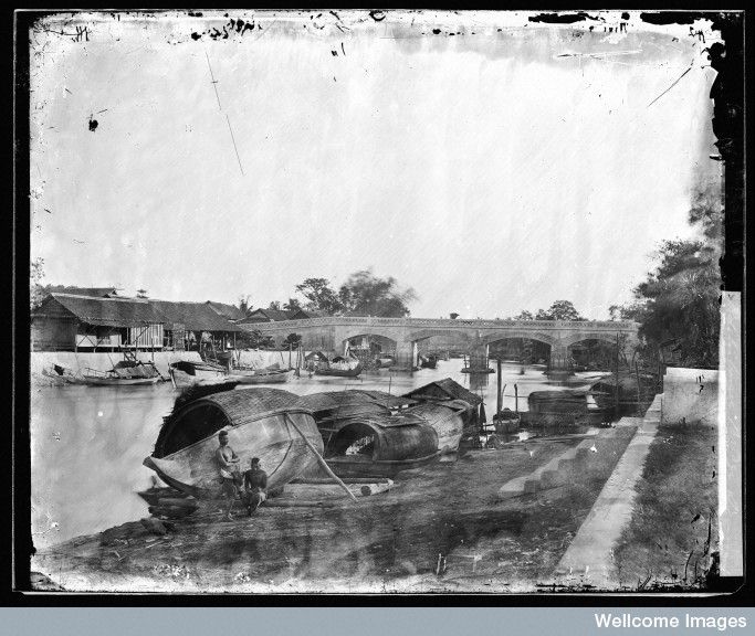 The river and bridge at Petchaburi, 1857. Photo by John Thomson.